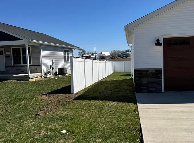 Vinyl fence separating 2 residential homes in Springfield IL